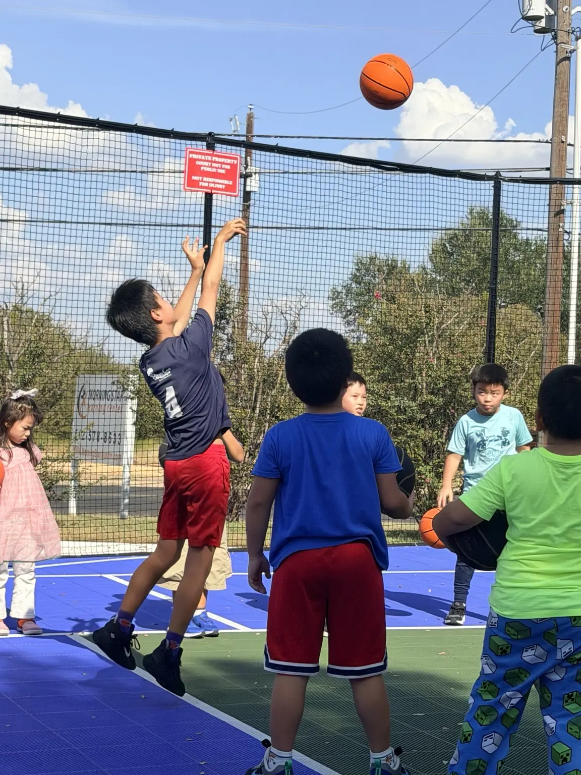 Students practicing basketball at Morning Star Campus